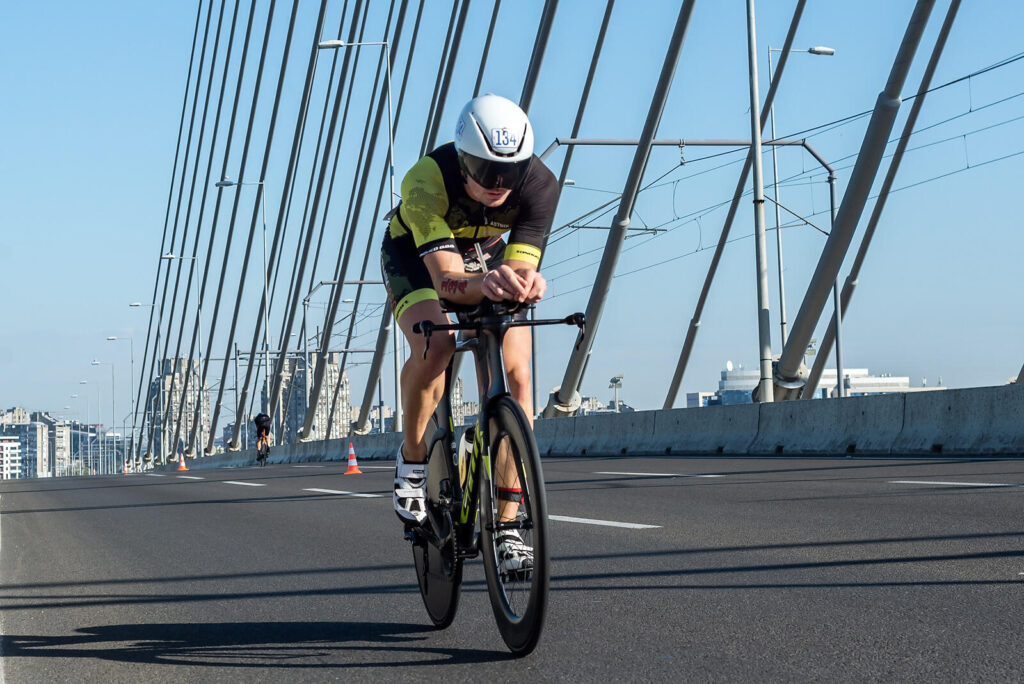 Primoz Kirn on a bicycle competing in a triathlon
