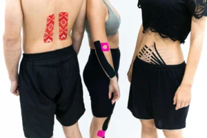 Three athletes with kinesiology tape applied to their back, arm, and abdomen to support muscle contractions and recovery.